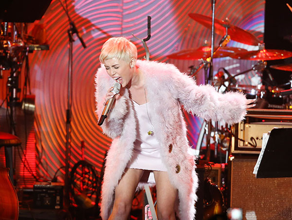 Lady Gaga, Miley Cyrus perform at pre-Grammy events